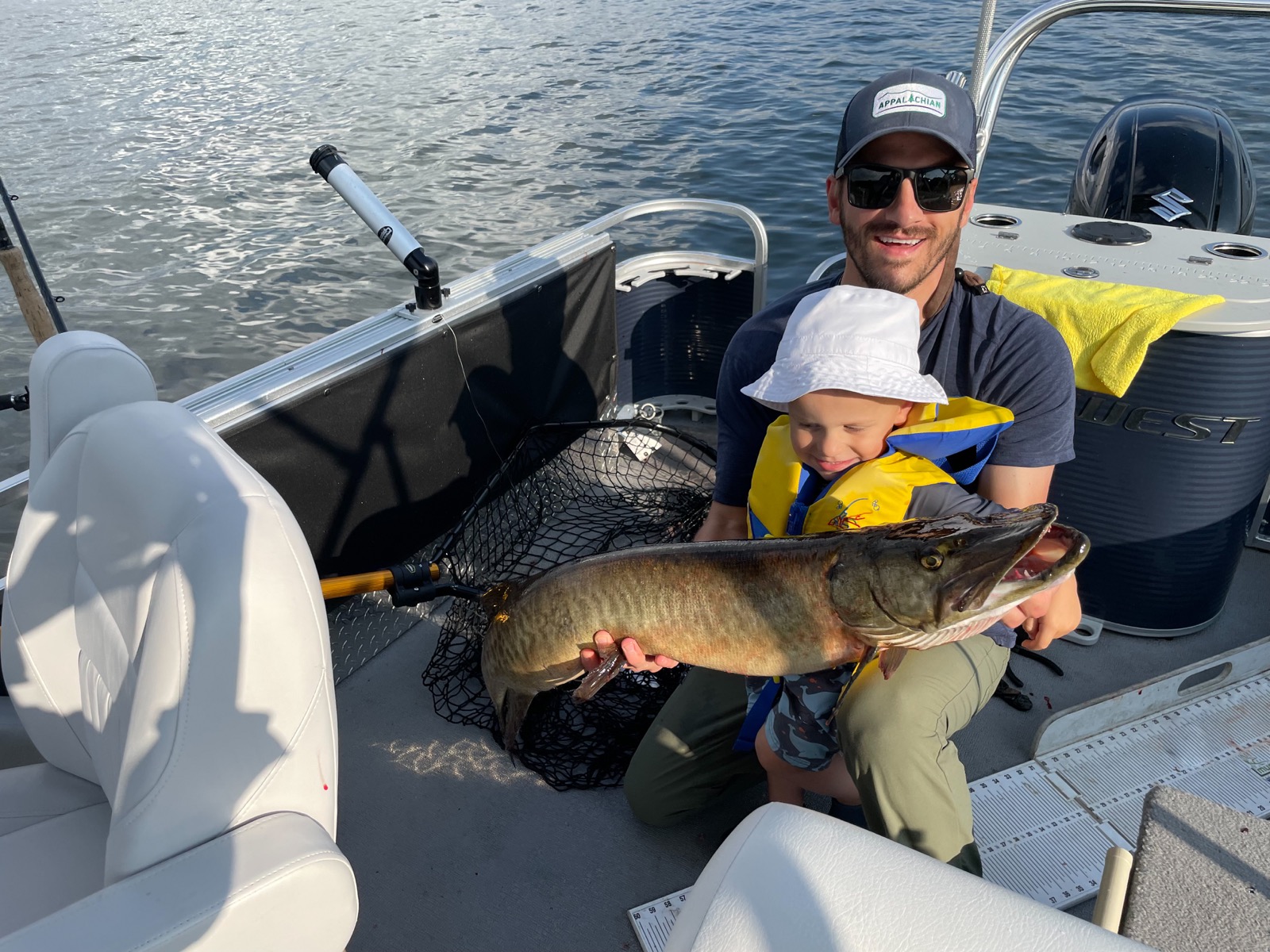Jason and son with a musky fish
